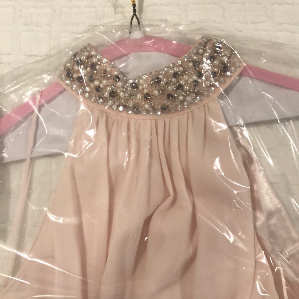 Light pink dress in very good condition.